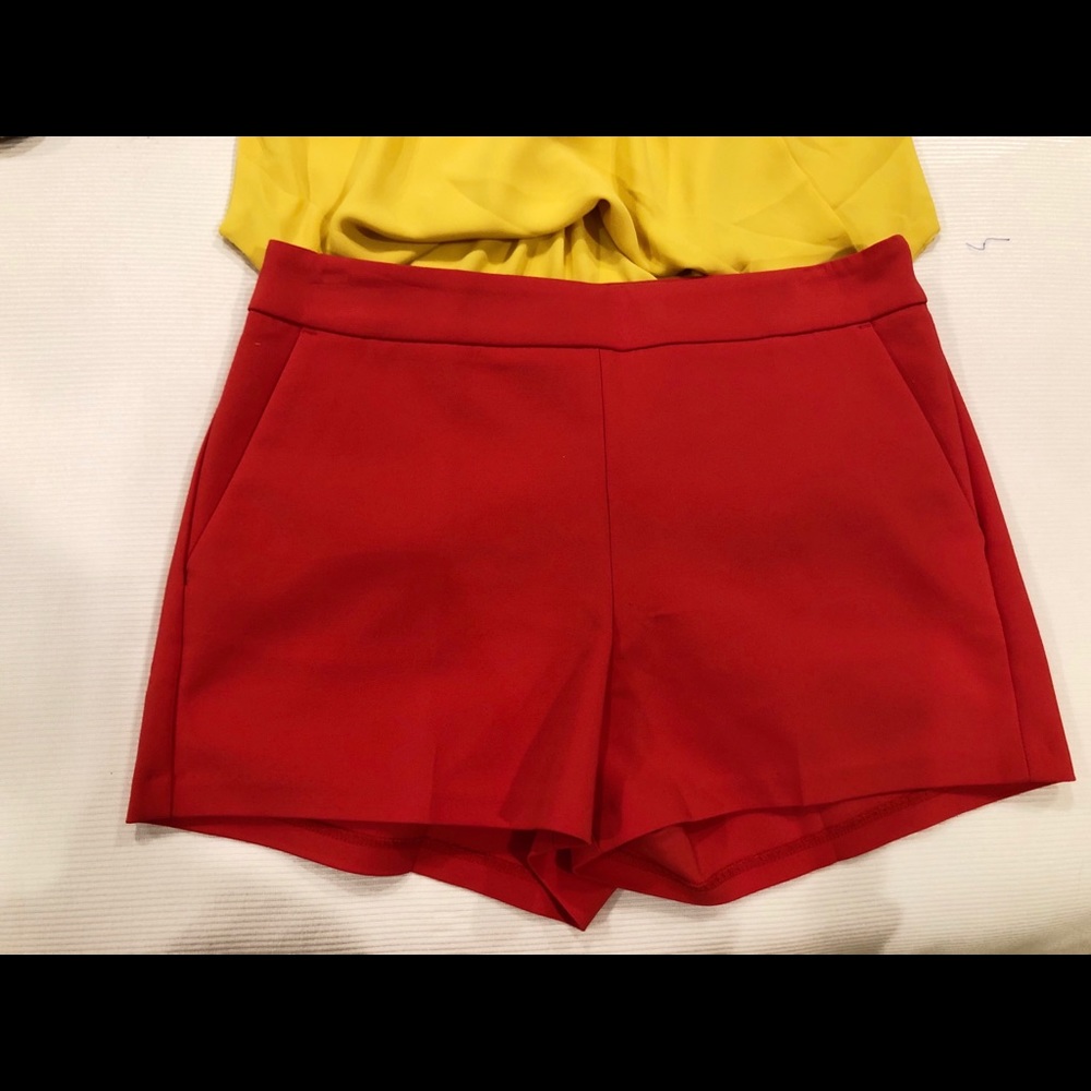 red mid rise shorts